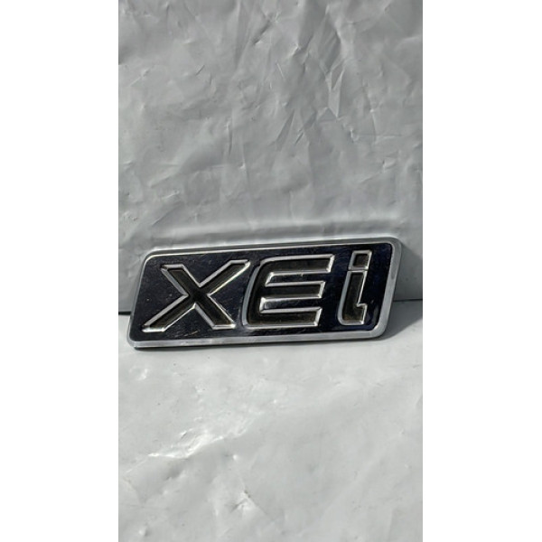 Emblema Tampa Traseira Toyota Corolla Xei Original 